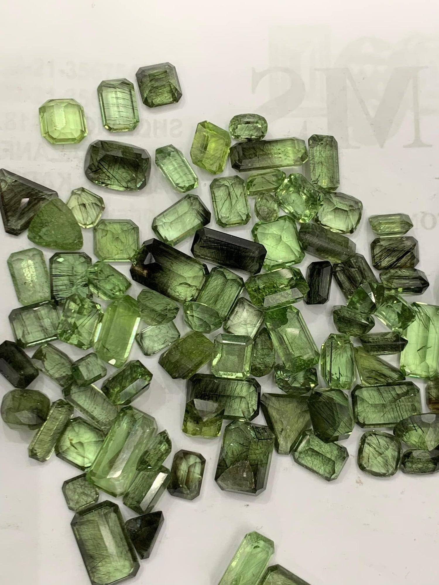 Buy rare Ludwigite Including Peridots  loose stones